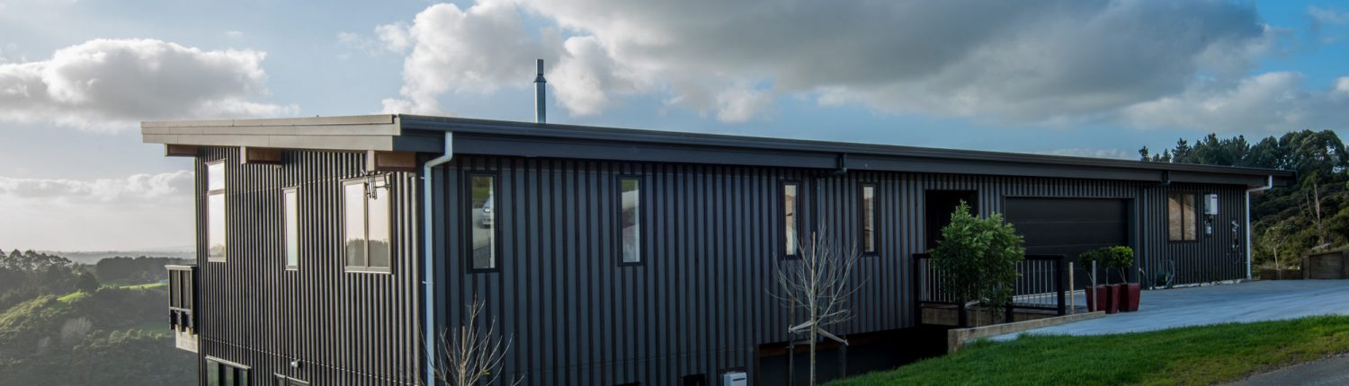 Outside view of the house with shadowclad cladding