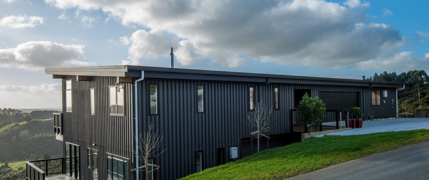 Outside view of the house with shadowclad cladding